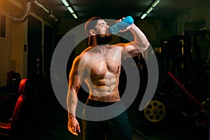 Man in the gym with shaker