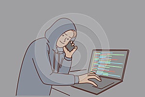 Man hacker with laptop and making phone call is engaged in telecom fraud and scamming money already photo