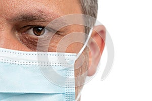 Man half face with medical mask and white copy space