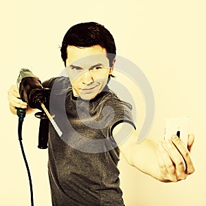 Man with hammer drill in hands.