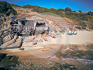 Man in hammock on a beach aerial view