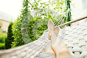 Man in a hammock on a summer day