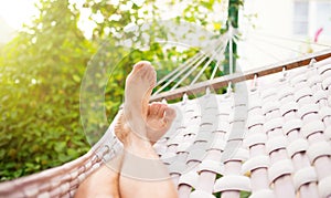 Man in a hammock on a summer day