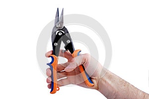 Man hand, bare, holding tin snips, isolated over white