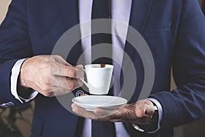 Man hand cup of coffee