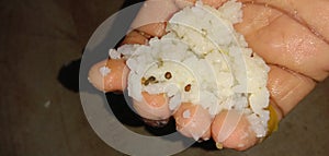 Man Hand Eating Cooked Rice