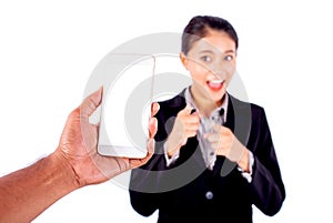 Man hand hold the mobile phone to take a picture of Asian beautiful business woman who point  to the phone and smile with stand on