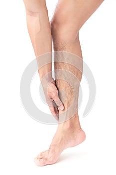 Man hand holding ankle leg pain with white background