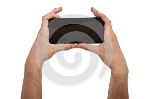 Man hand holding the black smartphone with blank screen