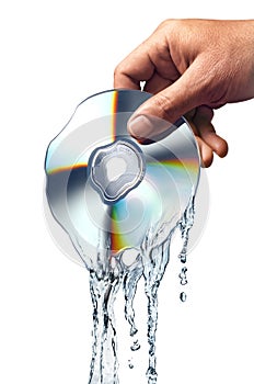 Man hand holding a CD melting into water.