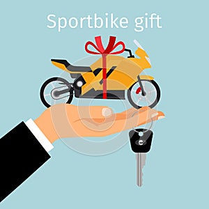 Man hand holding gift sportbike photo