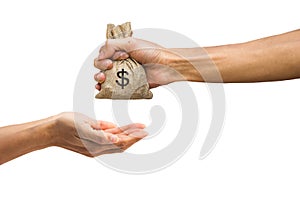 Man hand holding money bag and giving money to another person is