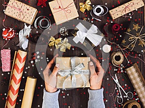 Man in hand holding new year gift box