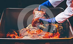 Man hand holding the raw meat