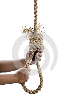 Man hand holding rope with a hangman noose knot