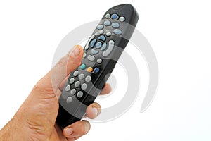 Man hand holds a remote controller