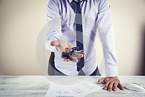 Man hand key in office desk