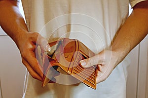 Man hand open empty wallet. Selective focus empty wallet for business concept