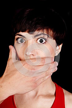 Man hand over mouth black