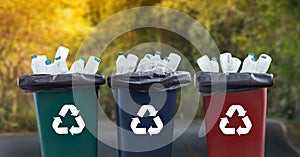 man hand putting plastic reuse for recycling concept environmen