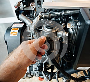 Man hand repairing demonstrating the new powerboat engine