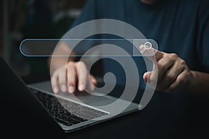 Man hand searching browsing for information internet data Technology on computer keyboard notebook.SEO Search Engine Optimization