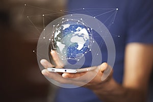 Man hand with smartphone and virtual sphere globe