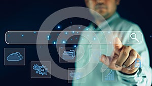 Man hand tapping on virtual search bar while using laptop, show search for information with internet technology connection