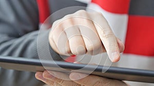 Man hand touching screen on modern digital tablet pc