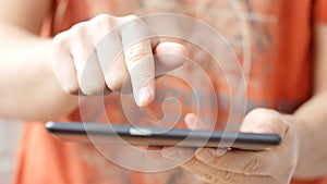 Man hand touching screen on modern digital tablet pc