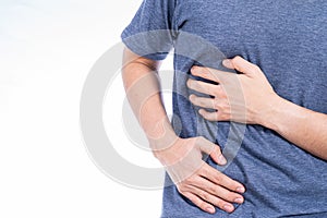 Man hand touching stomach, waist, or liver position isolated white background. Health care and medical concept