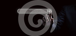 Man hand touching to virtual screening searching icon for Web search engine concept