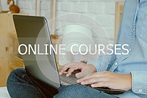 Man hand typing laptop and online courses word, e-learning concept