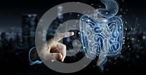 Man hand using digital x-ray of human intestine holographic scan projection 3D rendering