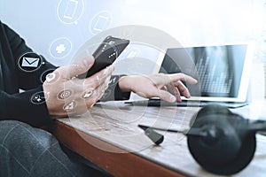 man hand using VOIP headset with digital tablet computer docking