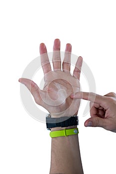 Man hand wearing watch and fitness band