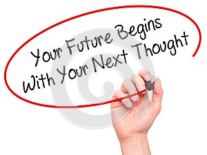Man Hand writing Your Future Begins With Your Next Thought with