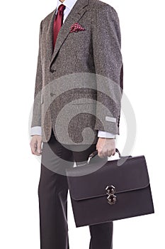 A man with a handbags in his hand