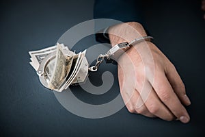 Man handcuffs with money