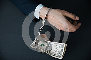 Man handcuffs with money