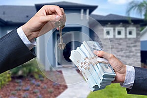 Man Handing a man Thousands of Dollars For Keys in Front of House.