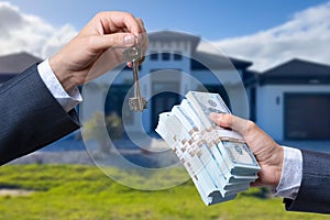 Man Handing a man Thousands of Dollars For Keys in Front of House.