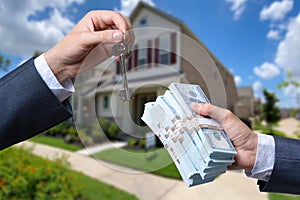 Man Handing a man Thousands of Dollars For Keys in Front of House.