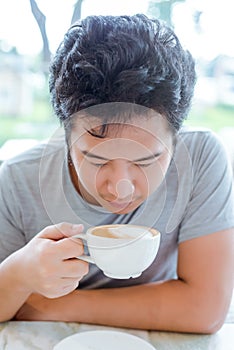 A man handle coffee for drink