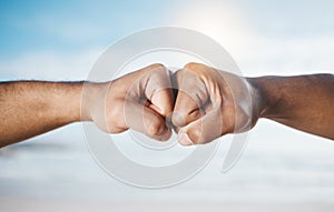 Man, hands and fist bump for partnership, unity or collaboration in deal or agreement outdoors. Hand of men or friends
