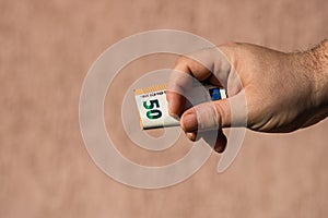 Man hands giving money like a bribe or tips. Holding EURO banknotes on a blurred background, EU currency