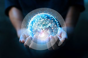 Man hands holding blue earth and global networking connection and data exchanges, global communication network concept, Elements photo