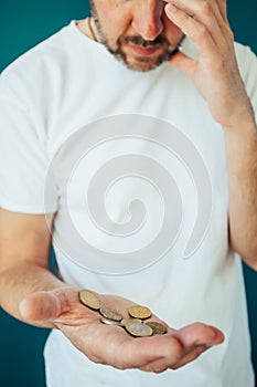 Man hands holding and counting euro money coins