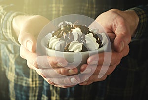 Man hands holding Cup of hot chocolate with marshmallows. Christmas, New Year, Winter background