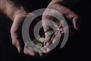 Man hands holding USSR rubles, money on a black background, close-